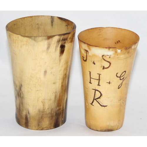 1653 - 2 antique horn beakers, one with engraved letters, the largest approx 11cm tall