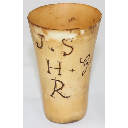 1653 - 2 antique horn beakers, one with engraved letters, the largest approx 11cm tall