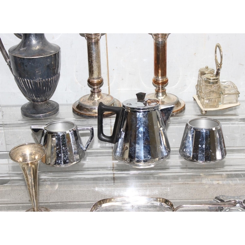 1024 - Qty of Antique and later silver plated items to include candlesticks and serving trays approx 7.2kg