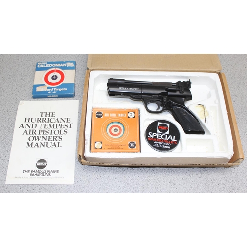 1454 - A Webley Tempest target shooting air pistol, .22 cal., with owners manual and targets, in box