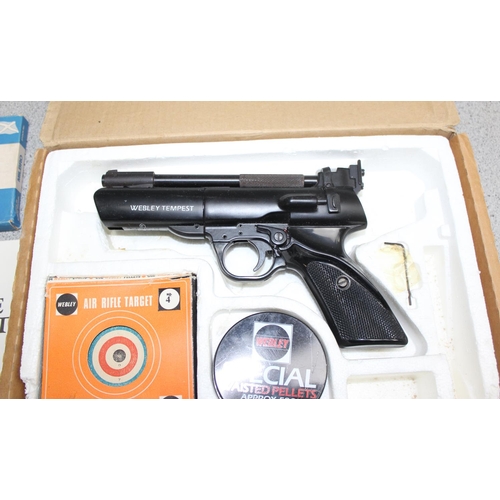 1454 - A Webley Tempest target shooting air pistol, .22 cal., with owners manual and targets, in box