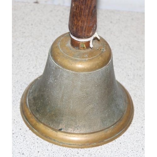 1646 - A vintage brass school bell with wooden handle, approx 24cm tall