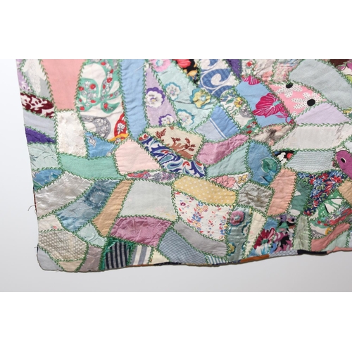 205 - A highly decorated colourful vintage patchwork quilt or blanket, likely early 20th century, approx 1... 