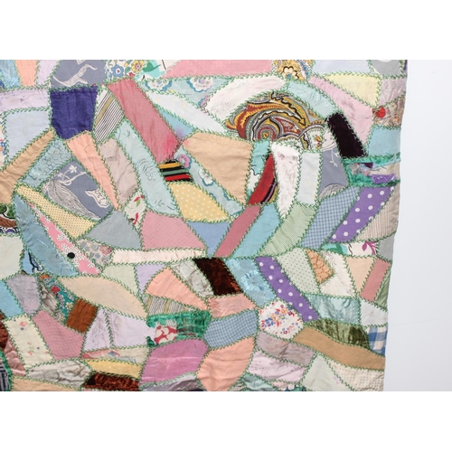 205 - A highly decorated colourful vintage patchwork quilt or blanket, likely early 20th century, approx 1... 