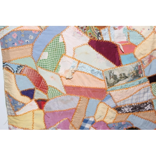 206 - A highly decorated colourful vintage patchwork quilt or blanket, likely early 20th century, approx 1... 