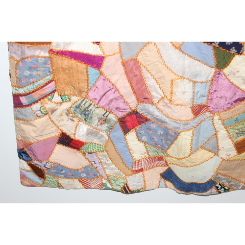 206 - A highly decorated colourful vintage patchwork quilt or blanket, likely early 20th century, approx 1... 