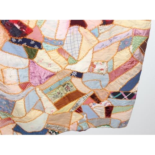 206 - A highly decorated colourful vintage patchwork quilt or blanket, likely early 20th century, approx 1... 