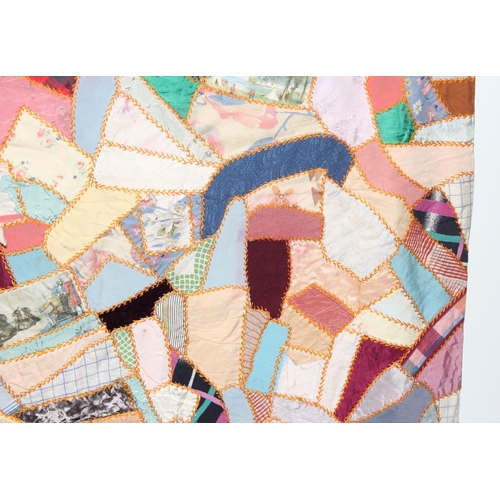 206 - A highly decorated colourful vintage patchwork quilt or blanket, likely early 20th century, approx 1... 