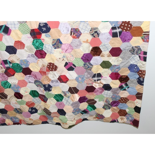 206 - A highly decorated colourful vintage patchwork quilt or blanket, likely early 20th century, approx 1... 