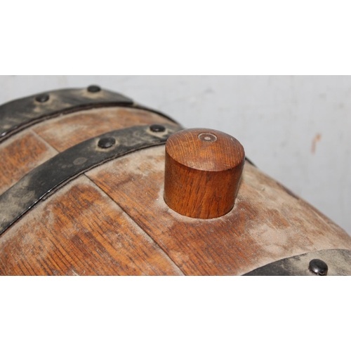 280 - Vintage oak coopered cider or ale barrel on wooden stillage, approx. 28cm wide x 38cm deep x 37cm ta... 