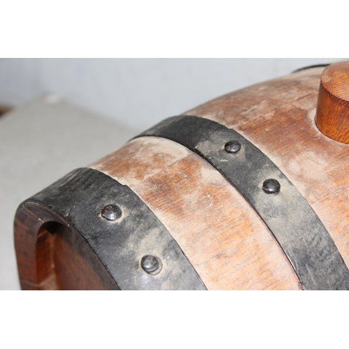 280 - Vintage oak coopered cider or ale barrel on wooden stillage, approx. 28cm wide x 38cm deep x 37cm ta... 