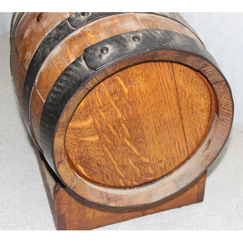 280 - Vintage oak coopered cider or ale barrel on wooden stillage, approx. 28cm wide x 38cm deep x 37cm ta... 