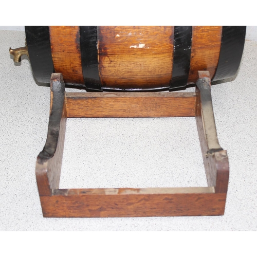 280 - Vintage oak coopered cider or ale barrel on wooden stillage, approx. 28cm wide x 38cm deep x 37cm ta... 