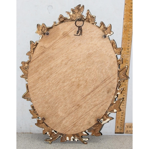 432 - A Victorian cast iron ivy leaf and berry designed wall mirror, bearing lozenge mark to reverse, appr... 