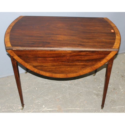 60 - An Edwardian Sheraton Revival mahogany drop leaf table with drawer, approx 107cm wide x 95cm deep x ... 