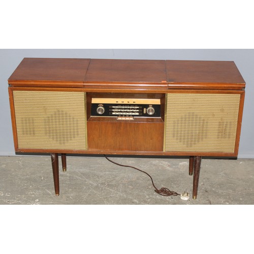 774 - A vintage Bush SRG91 Radiogram in wooden cabinet, approx 122cm wide x 39cm deep x 72cm tall