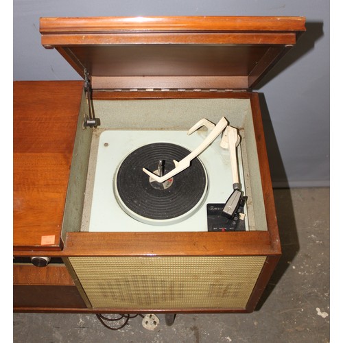 774 - A vintage Bush SRG91 Radiogram in wooden cabinet, approx 122cm wide x 39cm deep x 72cm tall