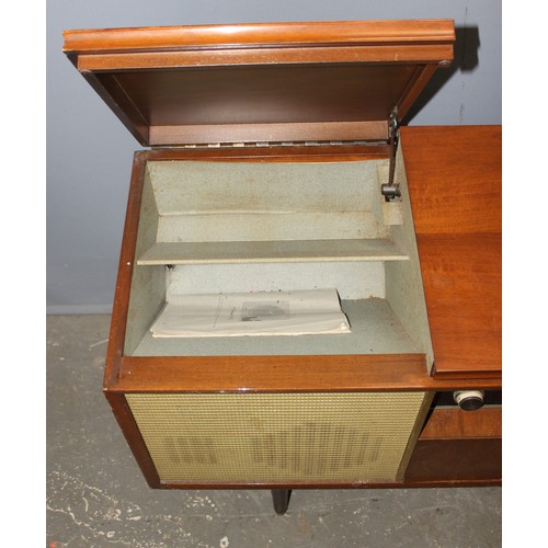 774 - A vintage Bush SRG91 Radiogram in wooden cabinet, approx 122cm wide x 39cm deep x 72cm tall