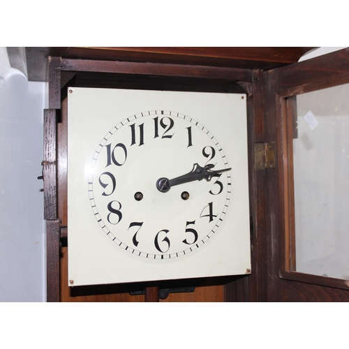 1302 - Art Deco period mechanical wall clock in mahogany case with pendulum and keys