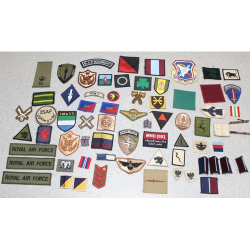 1448 - A large qty of assorted military fabric patches and medal ribbon bars etc, mainly 20th century