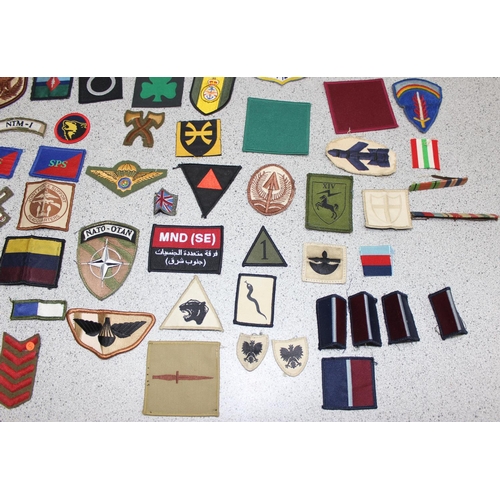 1448 - A large qty of assorted military fabric patches and medal ribbon bars etc, mainly 20th century