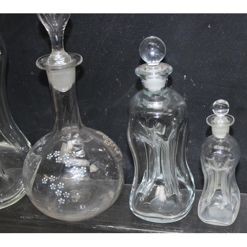 1642 - 3 vintage graduated Kluk-kluk/Glug-glug decanters with stoppers, and another decanter with enamelled... 