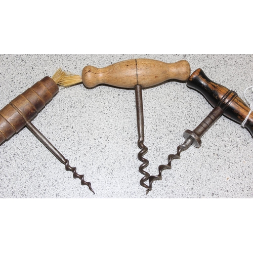 1643 - 4 vintage wooden handled corkscrews