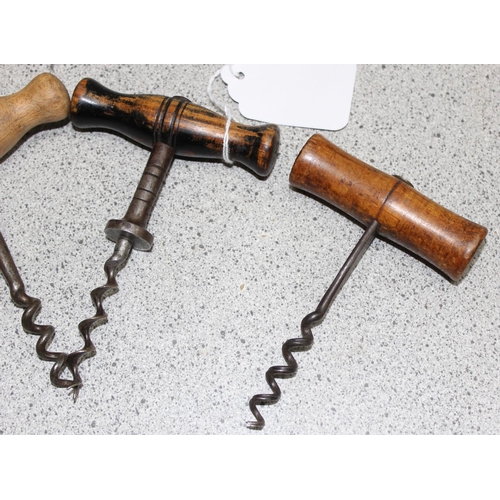 1643 - 4 vintage wooden handled corkscrews