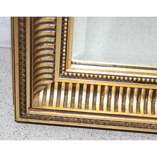 422 - Large gilt-framed hall mirror with bevelled edge, approx 101cm x 70cm