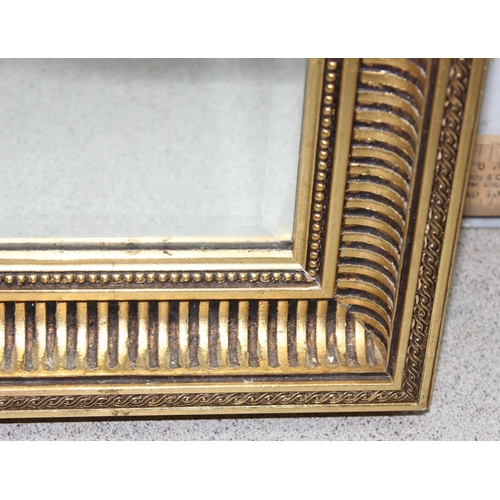 422 - Large gilt-framed hall mirror with bevelled edge, approx 101cm x 70cm