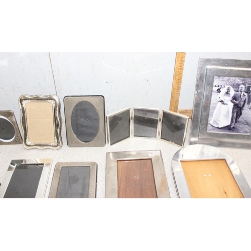 1010 - Qty of silver-plated photo frames