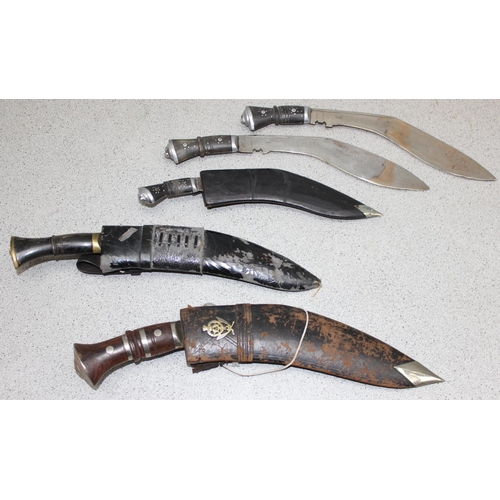 1403 - 5 assorted Kukri knives, 3 with sheaths, one bearing 5th Gurkha Rifles badge, another with blade sta... 