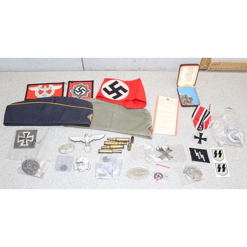 1405 - A qty of WW2 period and later German military related items to inc 2 side caps, various medals, badg... 