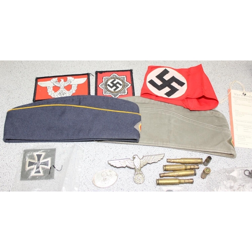 1405 - A qty of WW2 period and later German military related items to inc 2 side caps, various medals, badg... 