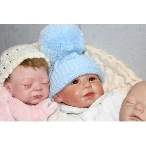 1510 - Qty of reborn style dolls, to incl Bountiful Baby and a wicker bassinet