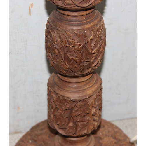 236 - 20th century Indian carved hardwood table lamp base with intricate leaf design, approx 51cm tall