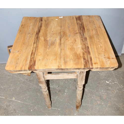 62 - An antique pine dropleaf kitchen table with single drawer, approx 84cm wide x 87cm deep x 74cm tall ... 