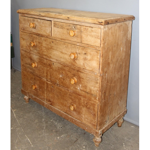 63 - An antique pine 2 over 3 chest of drawers with bun feet and handles, approx 84cm wide x 46cm deep x ... 