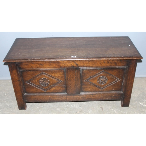 64 - A Jacobean style carved oak coffer or blanket box, approx 114cm wide x 46cm deep x 56cm tall