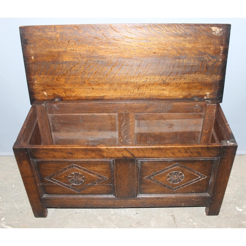 64 - A Jacobean style carved oak coffer or blanket box, approx 114cm wide x 46cm deep x 56cm tall