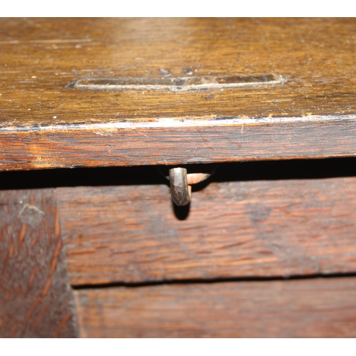 64 - A Jacobean style carved oak coffer or blanket box, approx 114cm wide x 46cm deep x 56cm tall