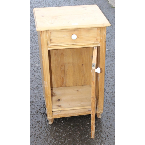 105 - A small vintage pine cabinet with white porcelain handle, approx 48cm wide x 40cm deep x 82cm tall