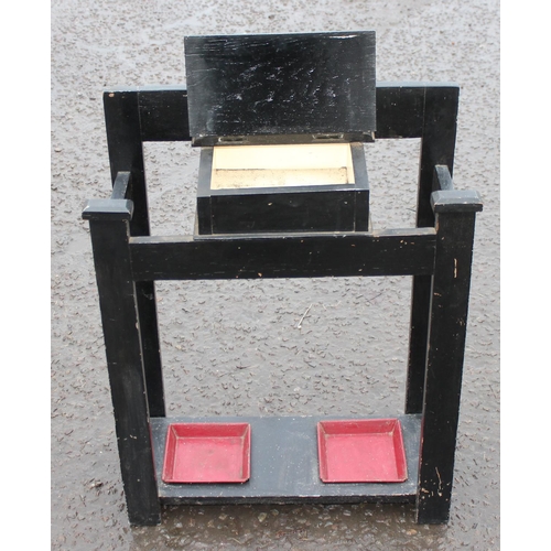 106 - A vintage black painted hall stick stand with umbrella drip trays and glove box, approx 59cm wide x ... 