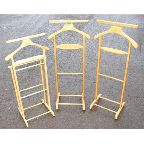 115 - 3 modern light wood valet stands, the largest approx 111cm tall