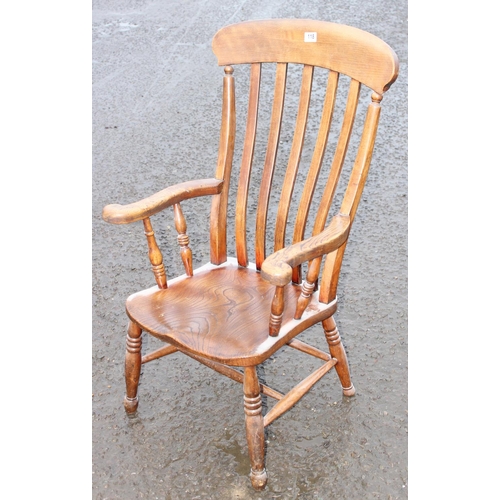 118 - An antique Windsor slat back farmhouse chair with elm seat, approx 107cm tall