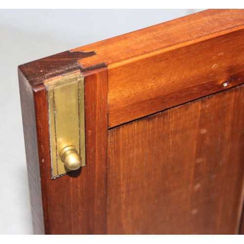 125 - A vintage wooden and brass coin collectors cabinet with 16 internal drawers by Peter Nichols, approx... 