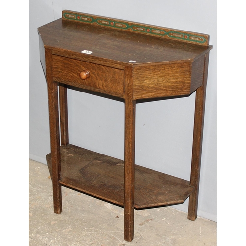 130 - An Art Deco period oak hall table of trapezium form, with single drawer, approx 70cm wide x 32cm dee... 