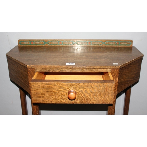 130 - An Art Deco period oak hall table of trapezium form, with single drawer, approx 70cm wide x 32cm dee... 