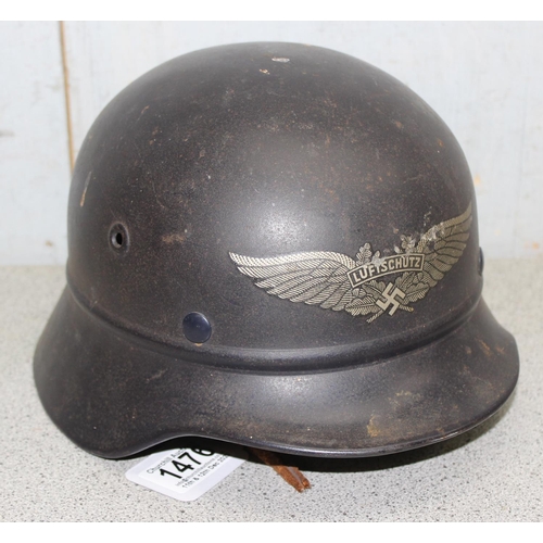 1476 - A WW2 period German Luftschutz (Civil Air Defence) helmet with decal, believed to be an M35 with par... 