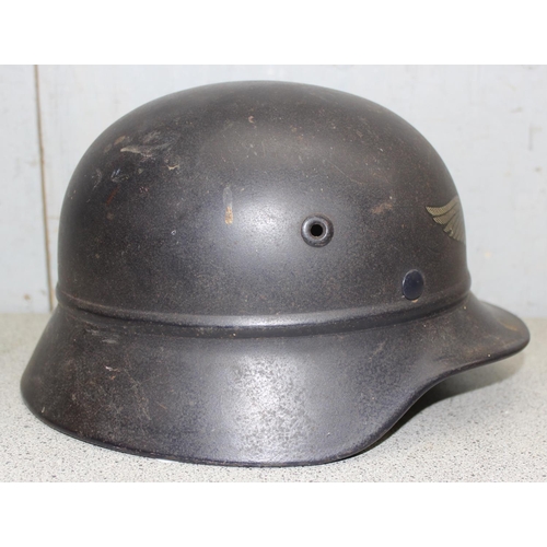 1476 - A WW2 period German Luftschutz (Civil Air Defence) helmet with decal, believed to be an M35 with par... 